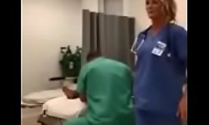 Nurse Showing Off Her Tits In Er