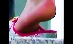 Girl  friend slips out of her ballerinas flats with her sweaty feet shoeplay