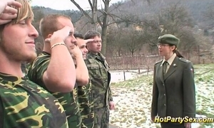Military playgirl acquires soldiers cum