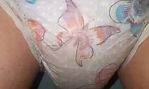 Teen floods pink pullup diaper