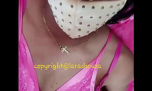 Indian crossdresser model Lara D'Souza in pink satin nighty
